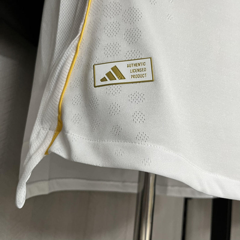 Camisa Real Madrid Titular 2025/26 - Versão Jogador Branco e Dourado